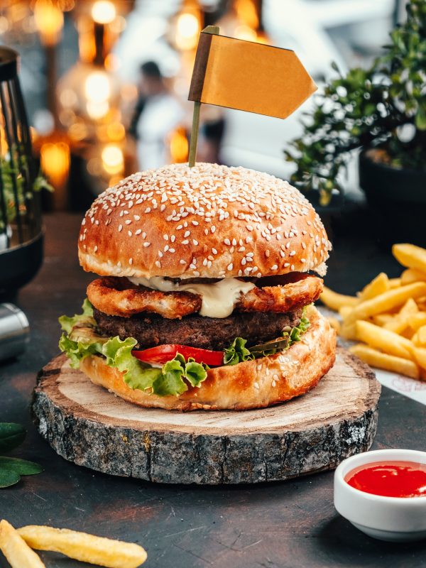 hamburger with french fries on the table